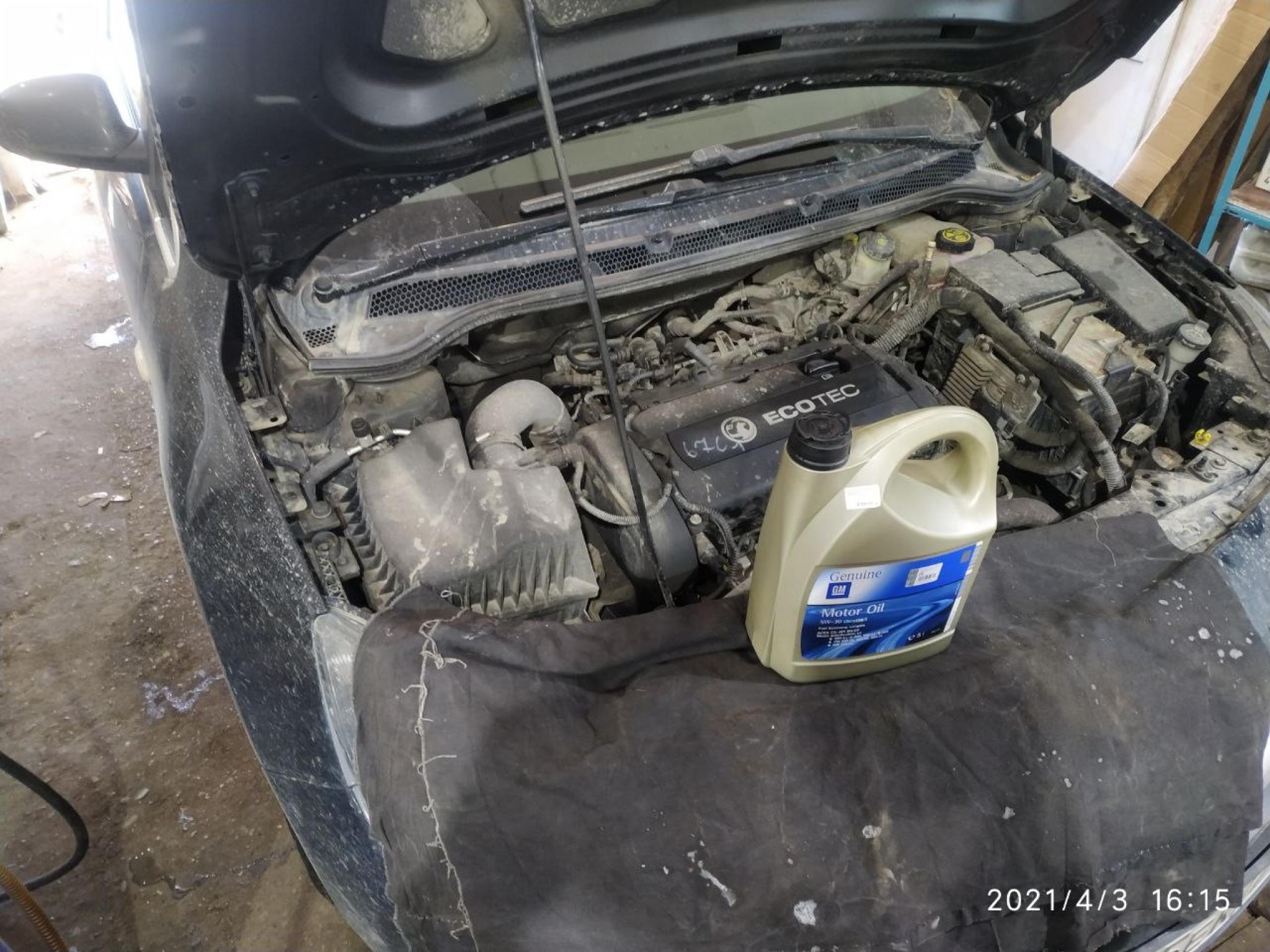 Замена масла на автомобиле Opel Astra.